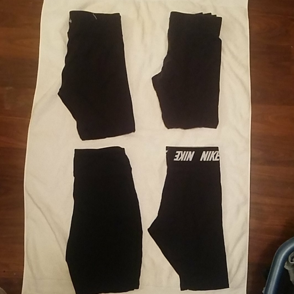4 pairs black athletic leggings size medium